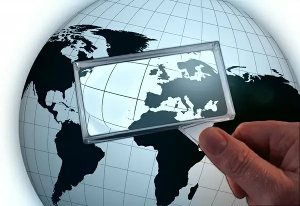 globe earth magnifying glass
