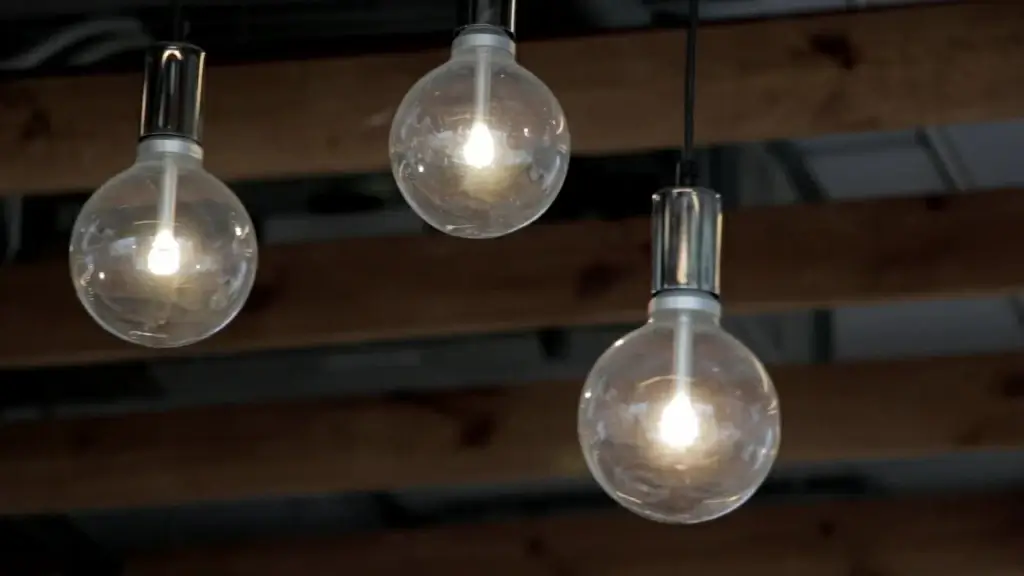 hanging light bulbs swinging in air