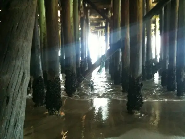 heart shining through beach pier