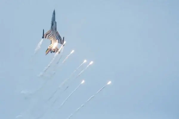 jet fighter with flares