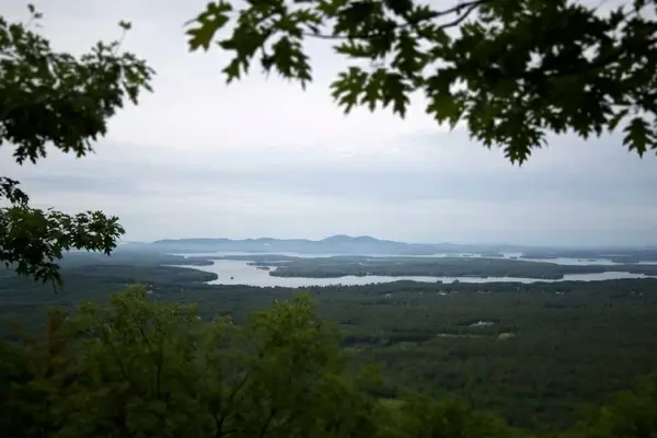 lake trees mountains clouds