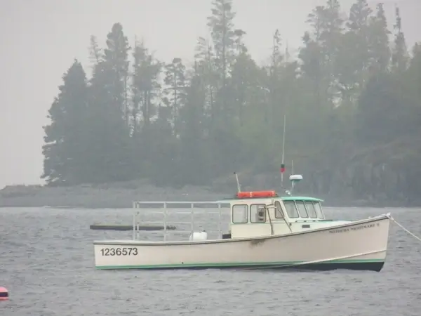 lobster boat in fog