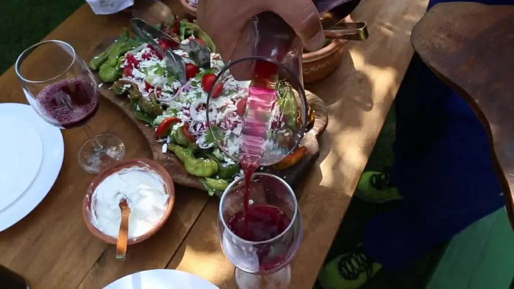 outdoor traditional cuisine with wine and tea