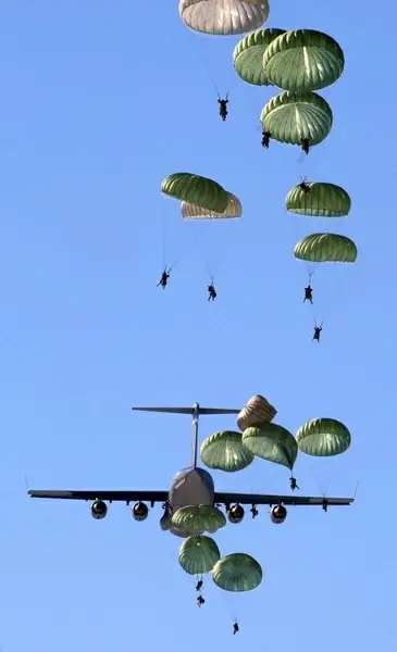 parachutes parachutists plane