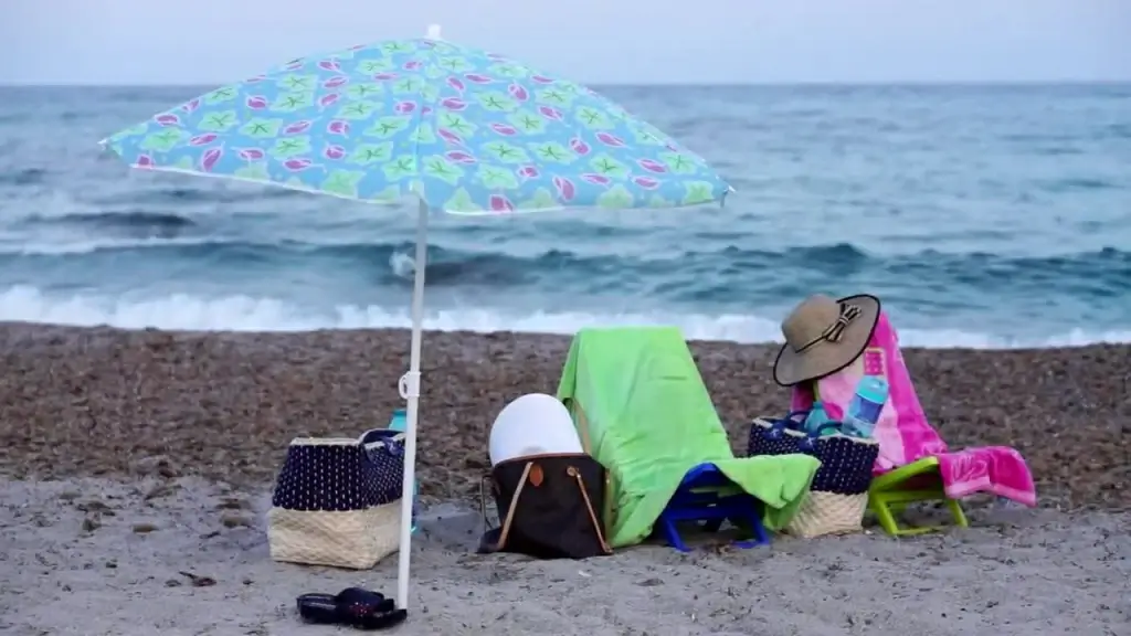 personal objects on ripple waving beach