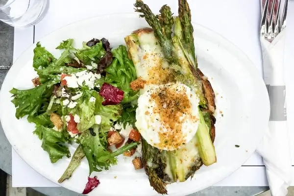 plate of salad and asparagus