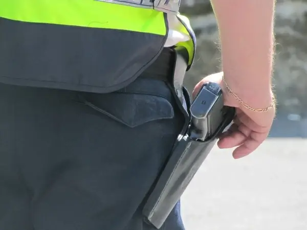 police officer pistol boredom