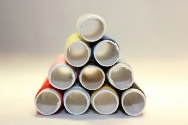 pyramid of thread bobbins