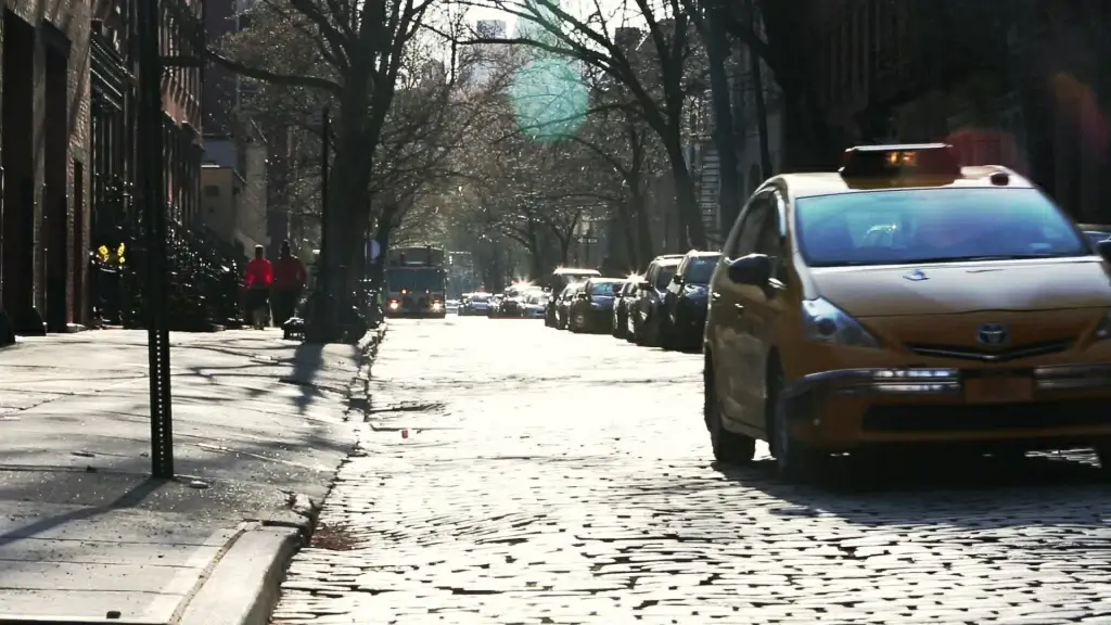 quiet street with few cars driving