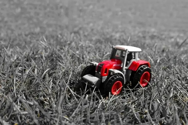 red tractor in the grass