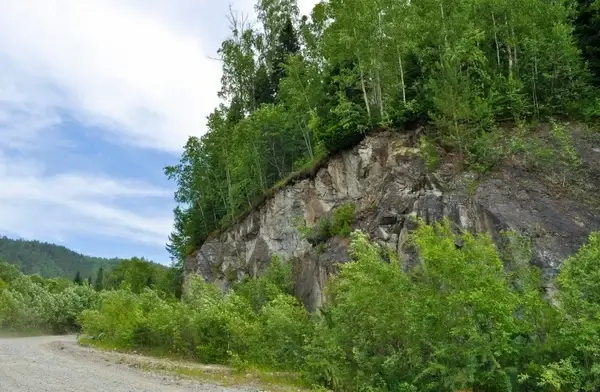 rock next to road 