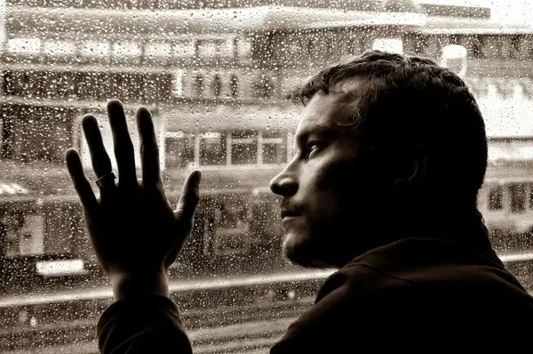 sad man and rain