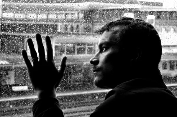 sad man and rain