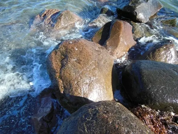 stone breakwater detail beach