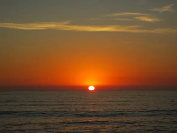 sunset ocean water clouds summer 