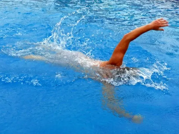 swimming man water