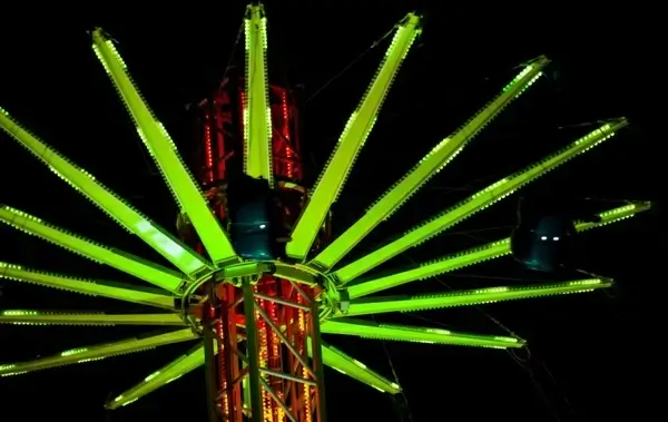 swing carousel at night