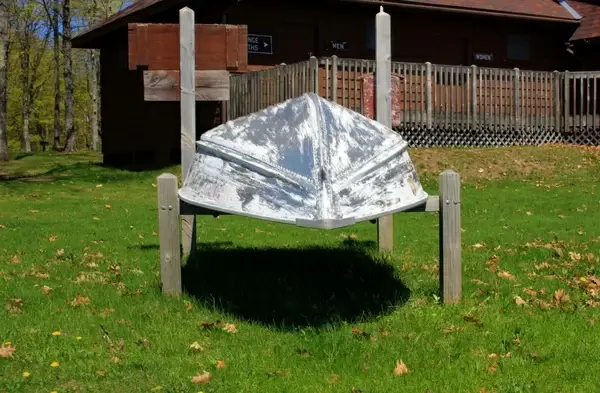 upside down boat on the shore at twin lakes state park michigan