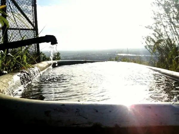 water overflowing bathtub outdoors