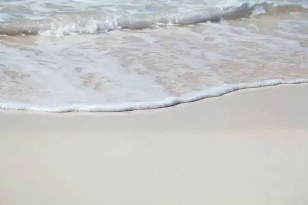 wave line foam on beach