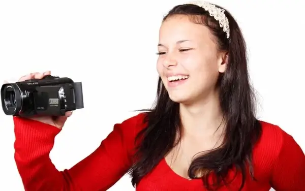 woman holding video camera