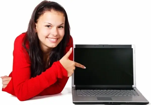 woman pointing at laptop