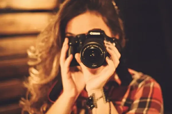 woman using camera 