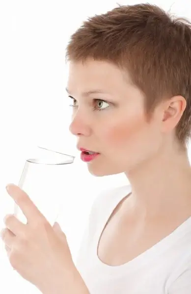 young woman drinking