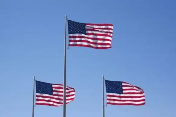 3 flags usa blowing in the wind