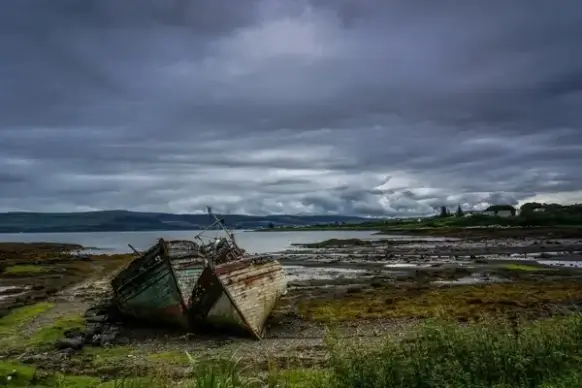 abandoned beach cloud coast dramatic dusk holiday