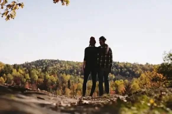 adult adventure clothes clothing daytime landscape