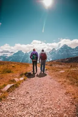 adventure travel picture people walking mountain range  scene 