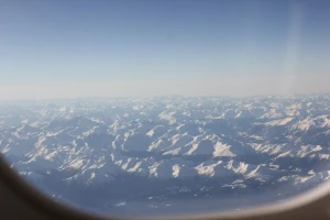 aerial aeroplane air airplane alps cloud cold down