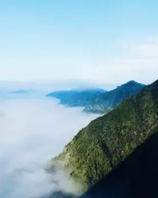 alps beach cloud fjord fog forest island lake