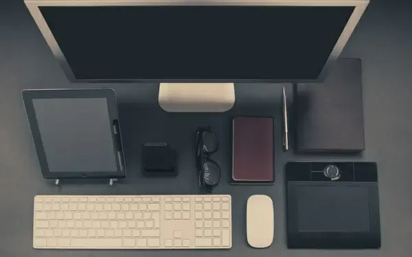 apple book computer desk dock glasses ipad iphone