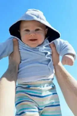 baby against blue sky