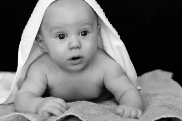 baby under the towel