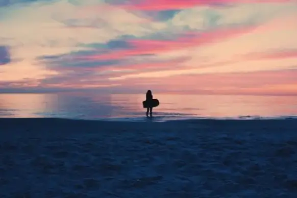 backlit beach coast dawn dusk evening fisherman
