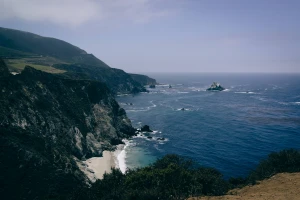 bay beach city cliffs coast coastline island