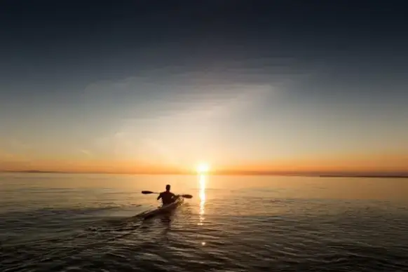 beach boat calm dawn dusk evening lake landscape