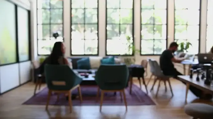blurred clip of people relaxing in cafeteria