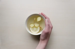 bowl close up cup down drink ginger hand health