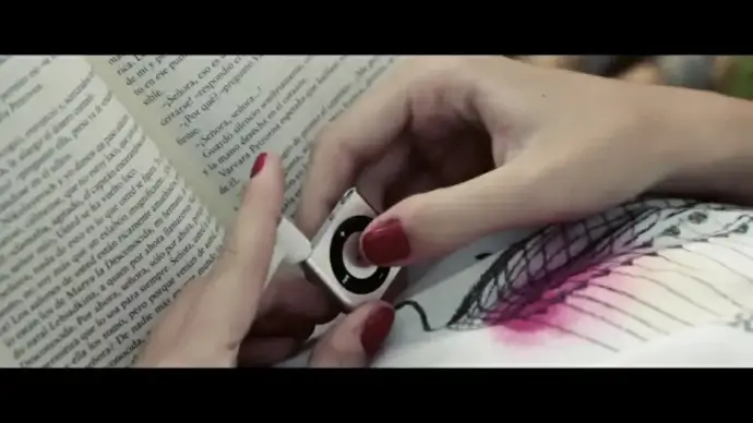 closeup of woman relaxing with book and music