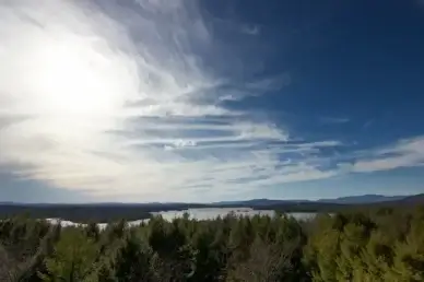 clouds trees lake