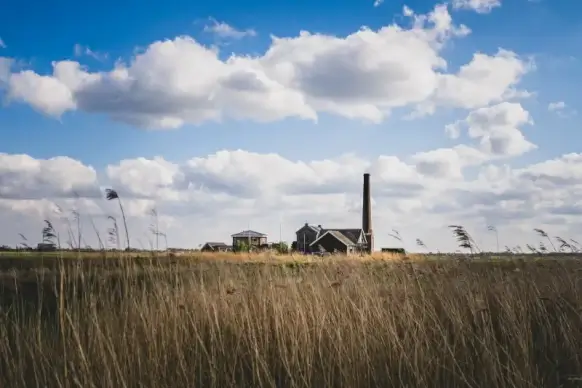 countryside scenery picture meadow cottage cloudy sky