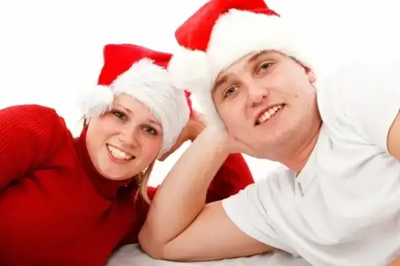 couple in santa hats