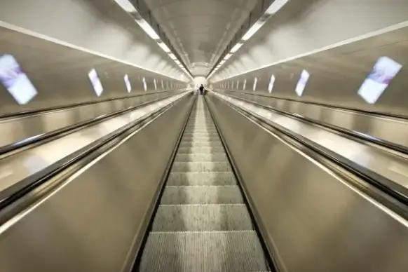 empty shiny steep escalator indoor