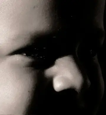 face in the shadow