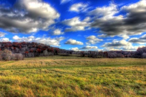 fast moving clouds over fields