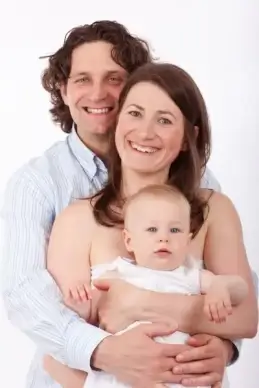 father mother and baby